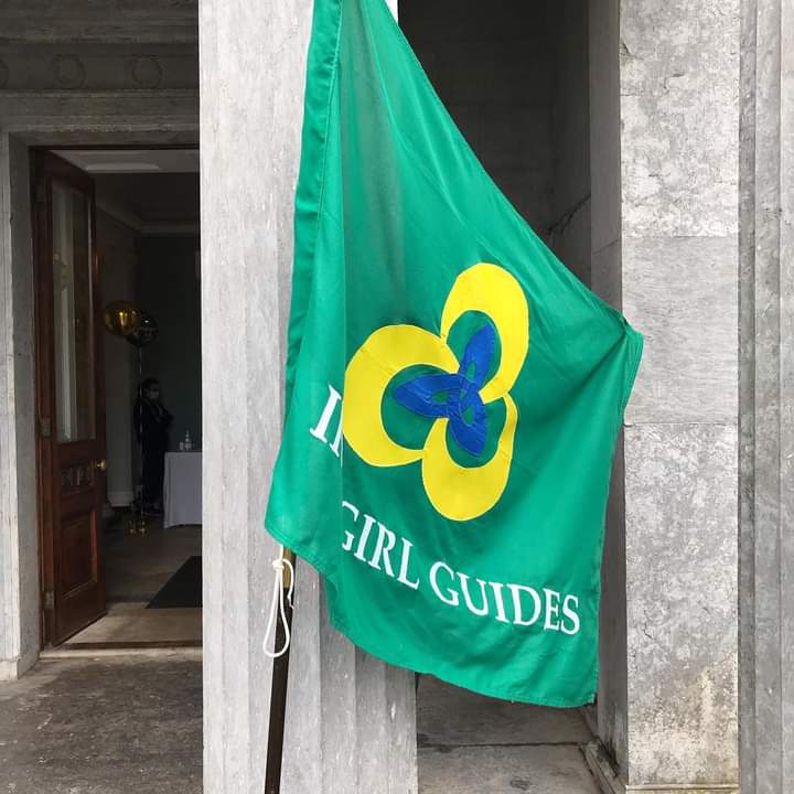 An green flag of the Irish Girl Guides